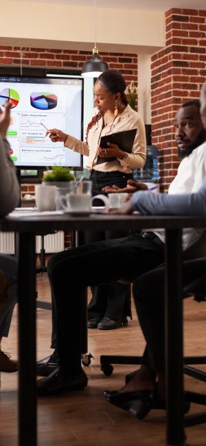 African american manager showing marketing presentation